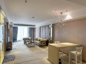 Posezení v ubytování Suning Universal Hotel ALL-SUITES