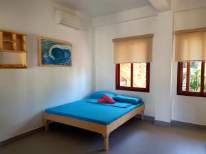 Voodi või voodid majutusasutuse Lokal Home Hostel toas