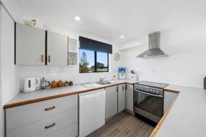 Kuchyň nebo kuchyňský kout v ubytování Seashell cottage