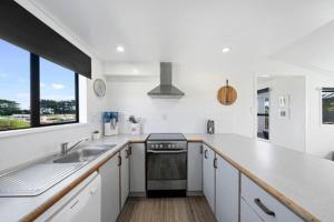 Kuchyň nebo kuchyňský kout v ubytování Seashell cottage