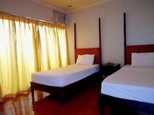 Postel nebo postele na pokoji v ubytování DDD Habitat, Inc - Cagayan De Oro + 9 fotografií