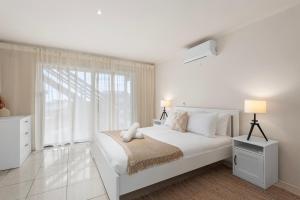 Ένα ή περισσότερα κρεβάτια σε δωμάτιο στο Springs Getaway, Bayviews, Sleeps 6, Boat Parking