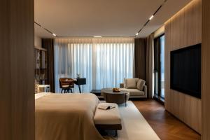 TV a/nebo společenská místnost v ubytování Taohuawu Mountain Luxury Villa Hotel