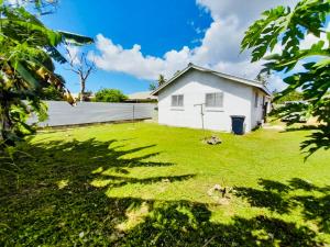 Κήπος έξω από το Private Double Room - Tonga Coral Cottage +4 φωτογραφίες