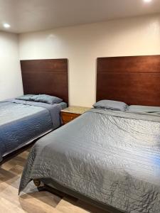 Postel nebo postele na pokoji v ubytování Valley Motel El Cajon San Diego