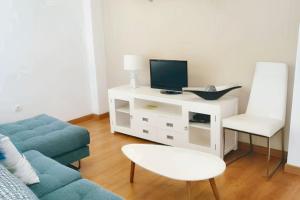 Televízia a/alebo spoločenská miestnosť v ubytovaní Modern Apartment Málaga 80 m² + Balcony