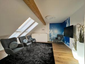 Μια τηλεόραση ή/και κέντρο ψυχαγωγίας στο BrandenburgApartment-Sky