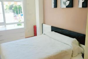 Posteľ alebo postele v izbe v ubytovaní Modern Apartment Málaga 80 m² + Balcony