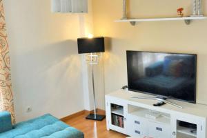 Televízia a/alebo spoločenská miestnosť v ubytovaní Modern Apartment Málaga 80 m² + Balcony