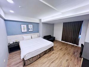 Letto o letti in una camera di Bonjour Hotel