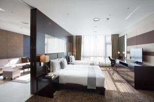 Postel nebo postele na pokoji v ubytování I Square Hotel + 37 fotografií