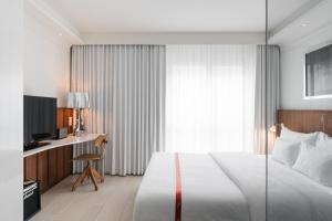 מיטה או מיטות בחדר ב-Ruby Sofie Hotel Vienna