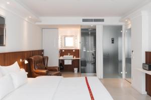מיטה או מיטות בחדר ב-Ruby Sofie Hotel Vienna