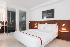 מיטה או מיטות בחדר ב-Ruby Sofie Hotel Vienna