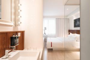 מיטה או מיטות בחדר ב-Ruby Sofie Hotel Vienna