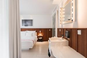 מיטה או מיטות בחדר ב-Ruby Sofie Hotel Vienna