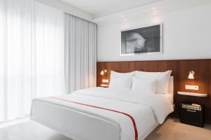 מיטה או מיטות בחדר ב-Ruby Sofie Hotel Vienna