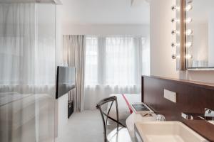 TV o dispositivi per l'intrattenimento presso Ruby Coco Hotel Dusseldorf