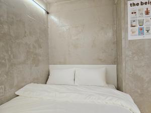 Ένα ή περισσότερα κρεβάτια σε δωμάτιο στο Residence Hotel Luo
