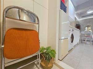 Μια τηλεόραση ή/και κέντρο ψυχαγωγίας στο Residence Hotel Luo