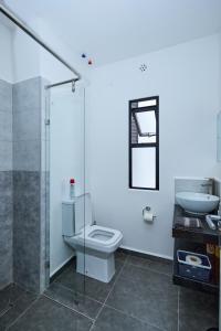 Koupelna v ubytování Orana homes + 6 fotografií