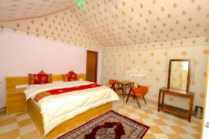 Desert Popular Resort & Camp客房内的一张或多张床位