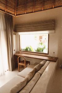 Postel nebo postele na pokoji v ubytování CASA ULU Boutique Hotel and Retreat, Adult-only, Uluwatu