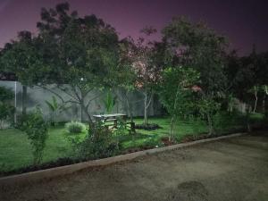 a picnic table in a park at night at Kasuba Two Bedroom Apartment in Livingstone