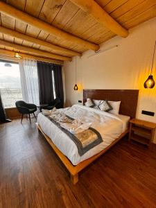 Yeti Resort Hunder客房内的一张或多张床位