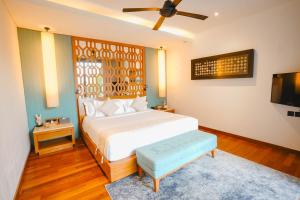 Postel nebo postele na pokoji v ubytování Maca Villas & Spa Bali