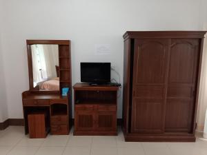 TV a/nebo společenská místnost v ubytování Phumchan Place Hotel