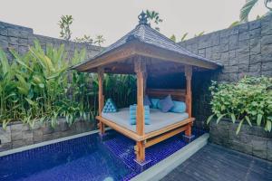 Bazén v ubytování Maca Villas & Spa Bali nebo v jeho okolí