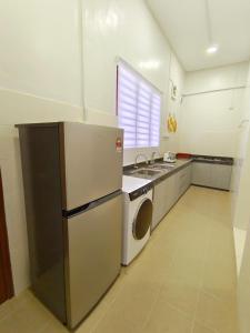 Billede fra billedgalleriet på Ong Lai Home Stay i Tanjung Karang