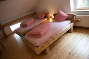 Postel nebo postele na pokoji v ubytování Hirschen B&B