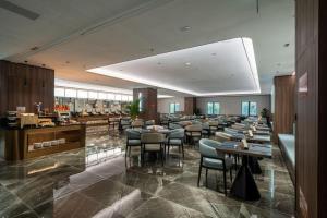Ресторан / где поесть в Xiamenair Maple Hotel (Xiamen SM City Plaza)
