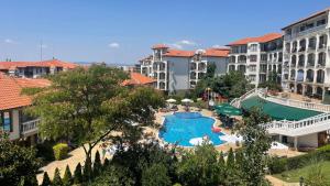 an aerial view of a resort with a swimming pool at Triumph Holiday Village in Sveti Vlas +21 photos