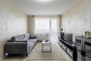 TV a/nebo společenská místnost v ubytování Coresi Mall Exclusive #Collection Apartments & Studios Brasov