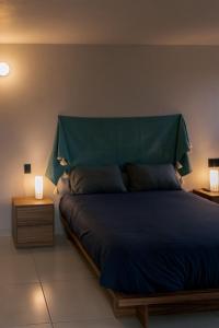 Postel nebo postele na pokoji v ubytování Casa Tonalli + 27 fotografií