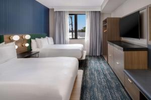 Ένα ή περισσότερα κρεβάτια σε δωμάτιο στο DoubleTree Suites by Hilton Mount Laurel