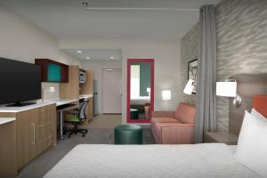 TV a/nebo společenská místnost v ubytování Home2 Suites By Hilton Georgetown Austin North
