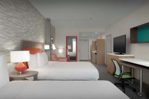 TV a/nebo společenská místnost v ubytování Home2 Suites By Hilton Georgetown Austin North