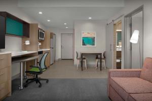 TV a/nebo společenská místnost v ubytování Home2 Suites By Hilton Georgetown Austin North