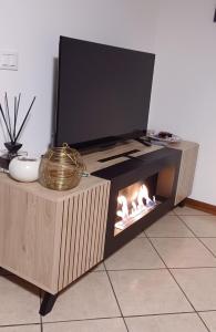 TV a/nebo společenská místnost v ubytování Casa di Minù