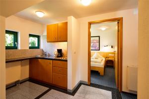 Postel nebo postele na pokoji v ubytování Hotel Gersfelder Hof