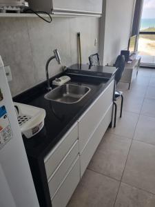 Kuchyň nebo kuchyňský kout v ubytování BARRA HOME STAY FANTASTICA Vista para o mar