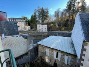 a view of a building with a metal roof at B9 villa MASSIAS in La Bourboule