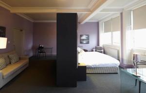 Postel nebo postele na pokoji v ubytování B+B Edinburgh