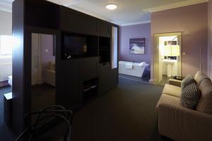 TV a/nebo společenská místnost v ubytování B+B Edinburgh