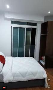 Katil atau katil-katil dalam bilik di Hotel Astoria Tanger