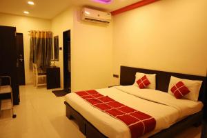 Hotel Sparkling Pearl客房内的一张或多张床位